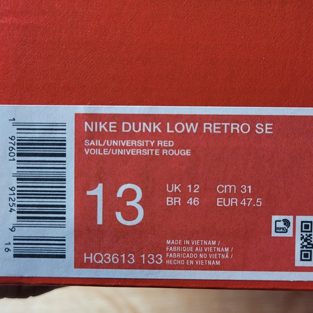 Nike White and Blue Sneakers with Orange Swoosh